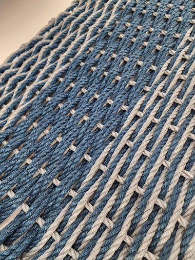 Large navy blue and light gray lobster rope mat with double basket weave pattern