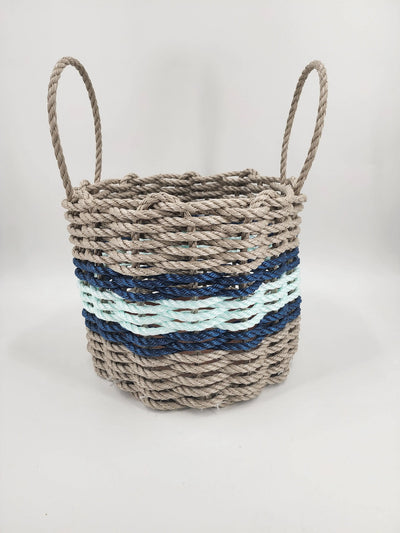 Handmade storage basket woven from Maine lobster rope in tan and seafoam with accent color