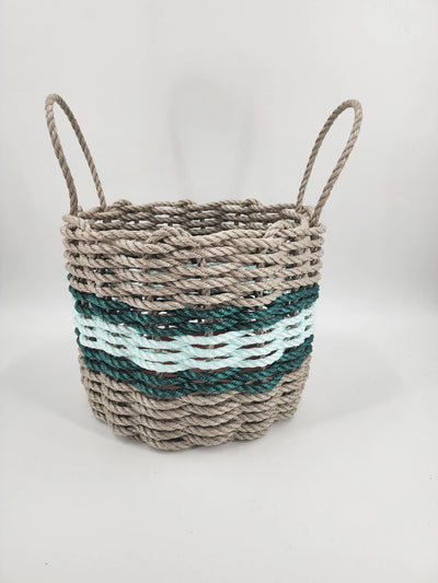 Handmade storage basket woven from Maine lobster rope in tan and seafoam with accent color