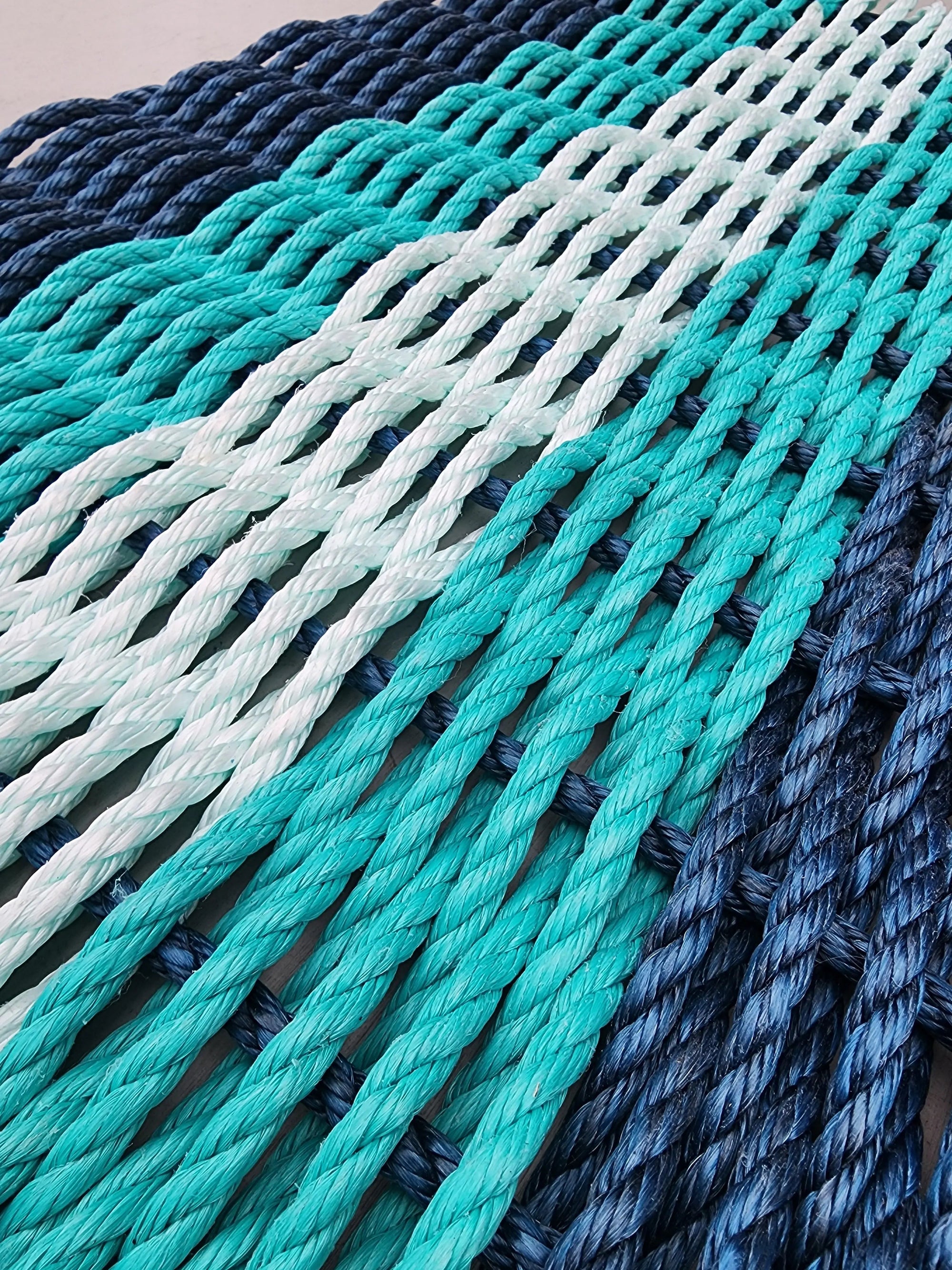 5 Stripe Lobster Rope Mat in Navy Blue, Teal, and Seafoam colors