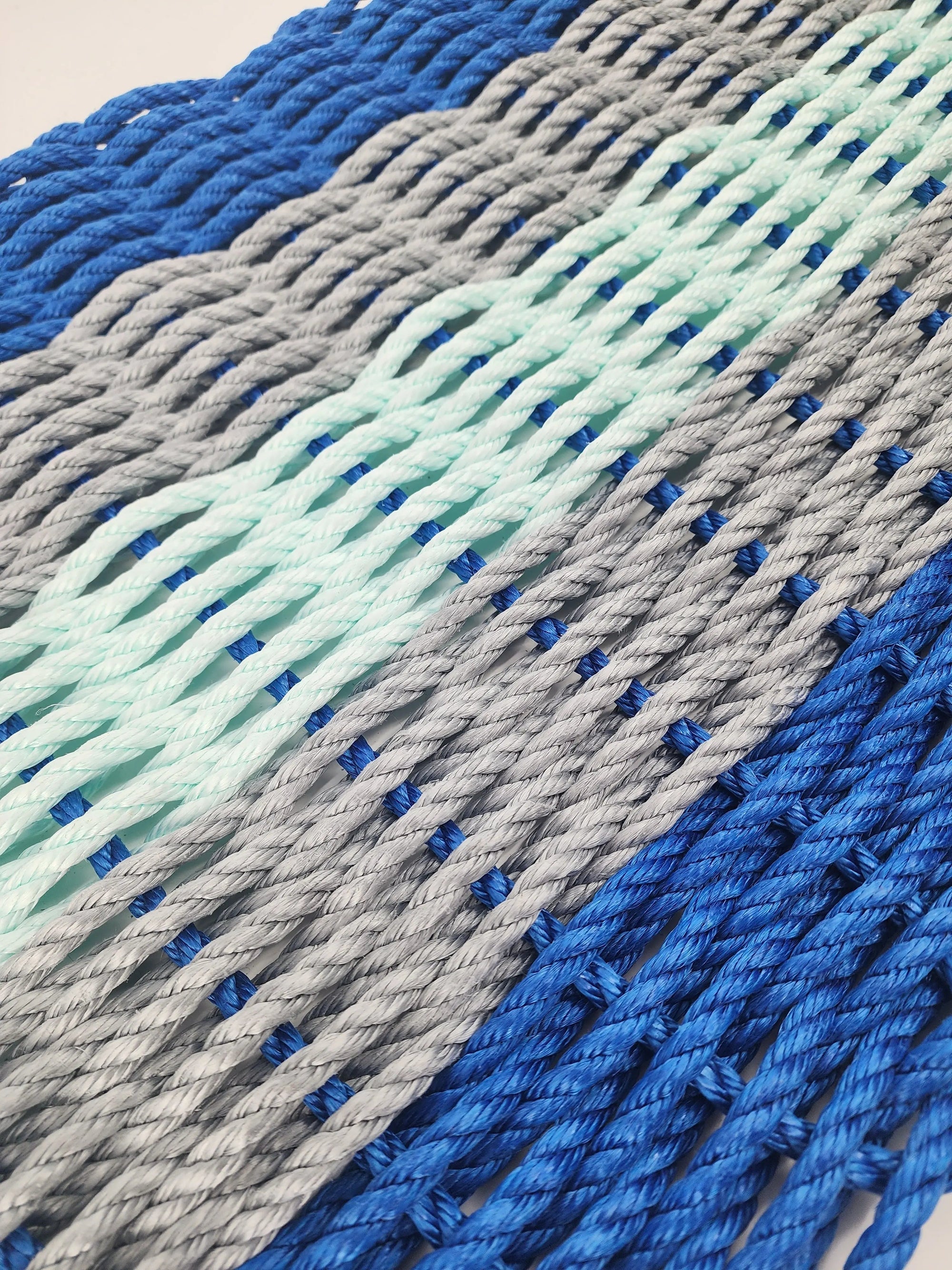 Five Stripe Rope Mat made with Lobster Rope in Blue Gray and Seafoam colors