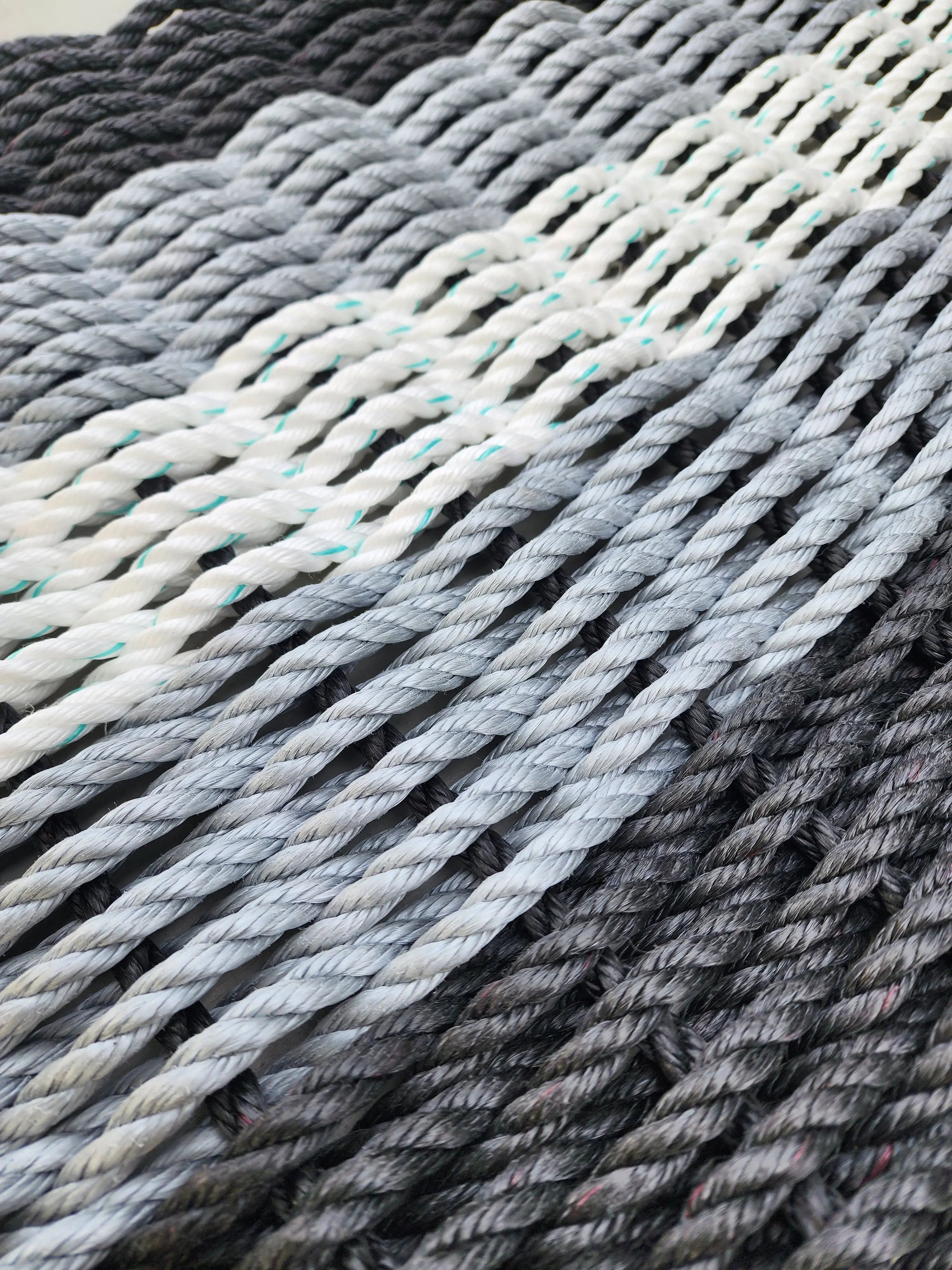 5 Stripe Lobster Rope Mat in black, gray, and white stripes by Little Salty Rope