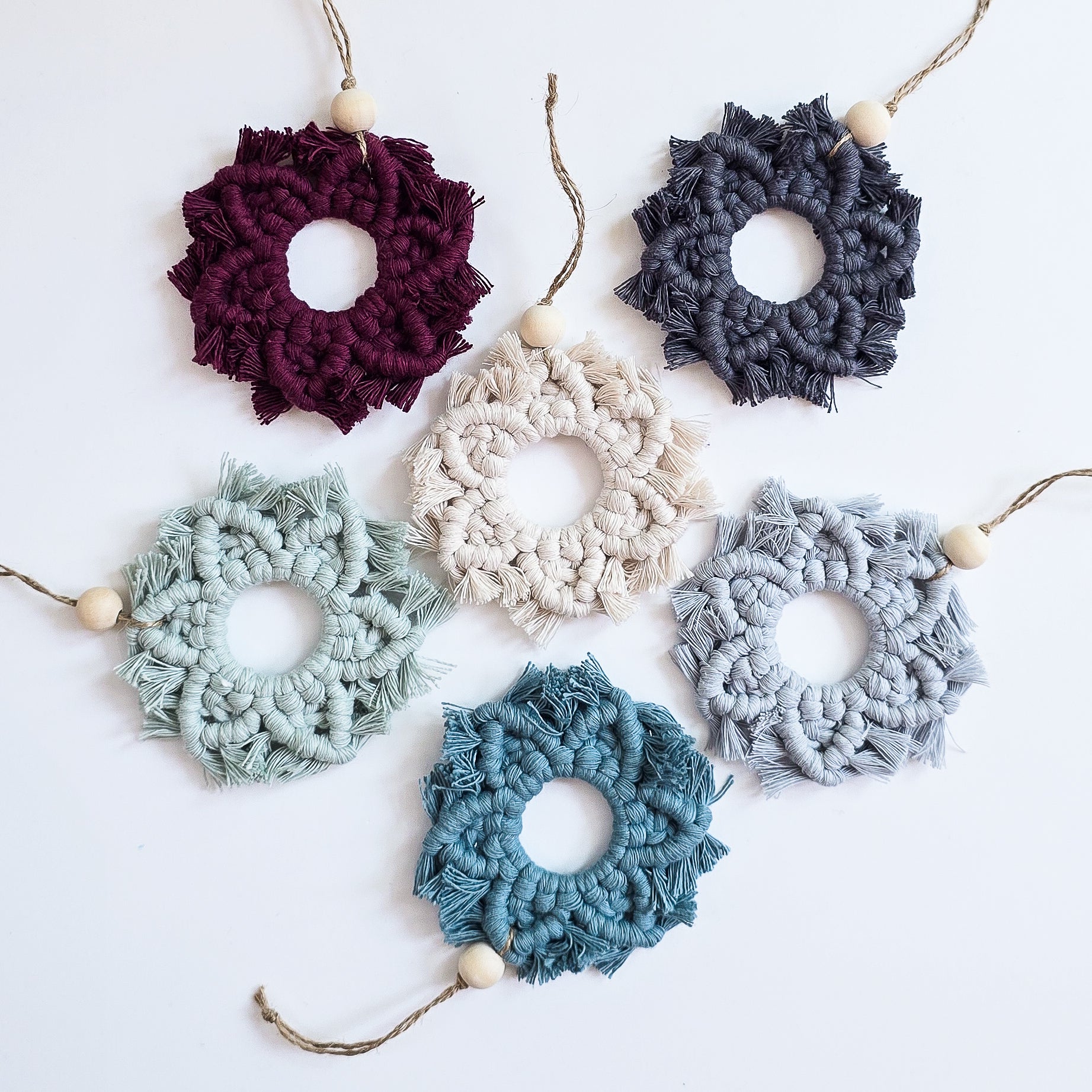 Macrame Snowflake Ornament in natural off white color with wooden diffuser bead