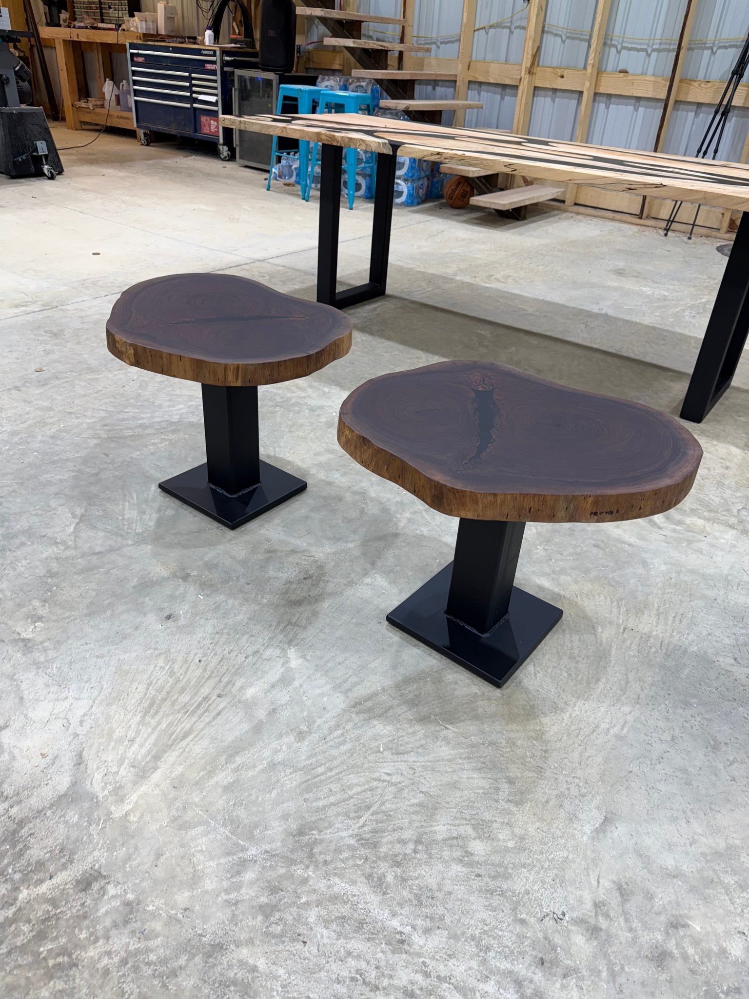 Walnut Cookie Side Tables with thick steel bases, handcrafted by Sasquatch Tables LLC