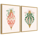 Two framed canvas art pieces featuring vintage-style holiday ornaments with green and pink patterns and floral details.