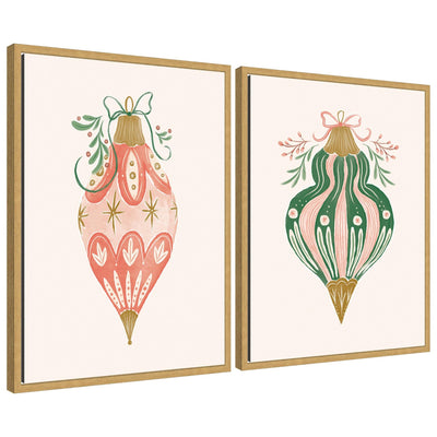 Two framed canvas art pieces featuring vintage-style holiday ornaments with green and pink patterns and floral details.