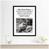Framed black and white print styled as a vintage newspaper front page titled The Good Times, featuring a photo of a woman lounging on a blanket in a bikini with the headline Dolce Far Niente.