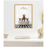Three brown bears sitting in a gray bathtub with gold claw feet on a black and white checkered floor, against a white paneled wall with a modern chandelier.