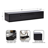 Rectangular black floating wall console with single front drawer, 30 inches wide and 6 inches tall, featuring a slim handle and secure hanging hardware.