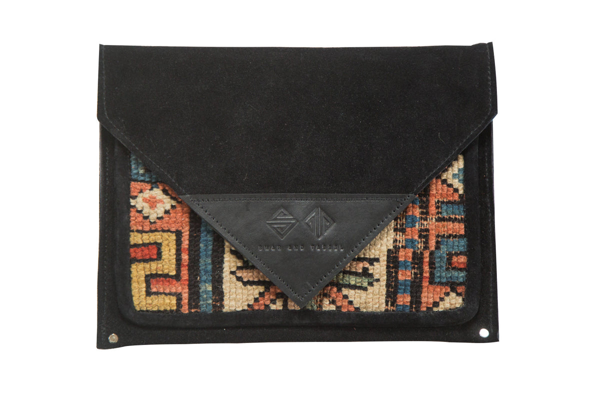 Handmade Rug Fragment Clutch showing antique Caucasian rug design and metal zipper