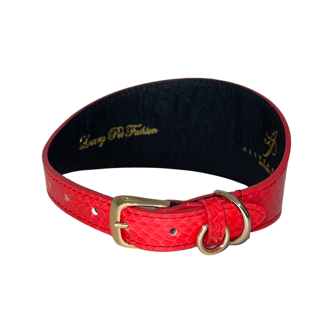 Bright red-orange wide pet collar with snake texture, gold-tone buckle and D-ring, black interior lining, angled view on white background