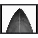 Close-up abstract minimalist depiction of a black surfboard nose with a central white line, framed in black against a white background.