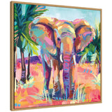 Colorful painting of an African elephant with vibrant pink, orange, and blue hues standing amidst abstract foliage and a bright sky in a wooden frame.