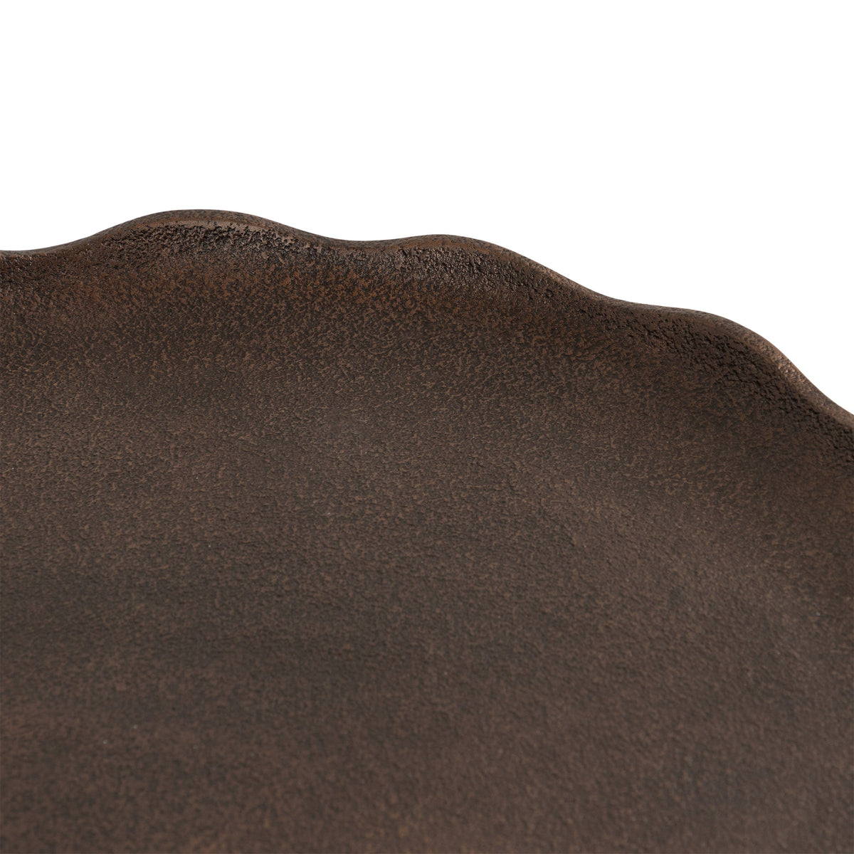Dark brown decorative tray with an irregular, wavy edge and textured finish, shown in close-up on a white background.
