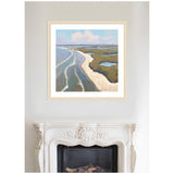 Framed coastal landscape painting by Mary Sparrow above an ornate white fireplace, depicting a shoreline with waves, sandy beach, and marshland under a blue sky with clouds.