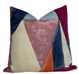 Square pillow cover featuring abstract geometric shapes in claret, beige, navy, rust, and light blue velvet textures.