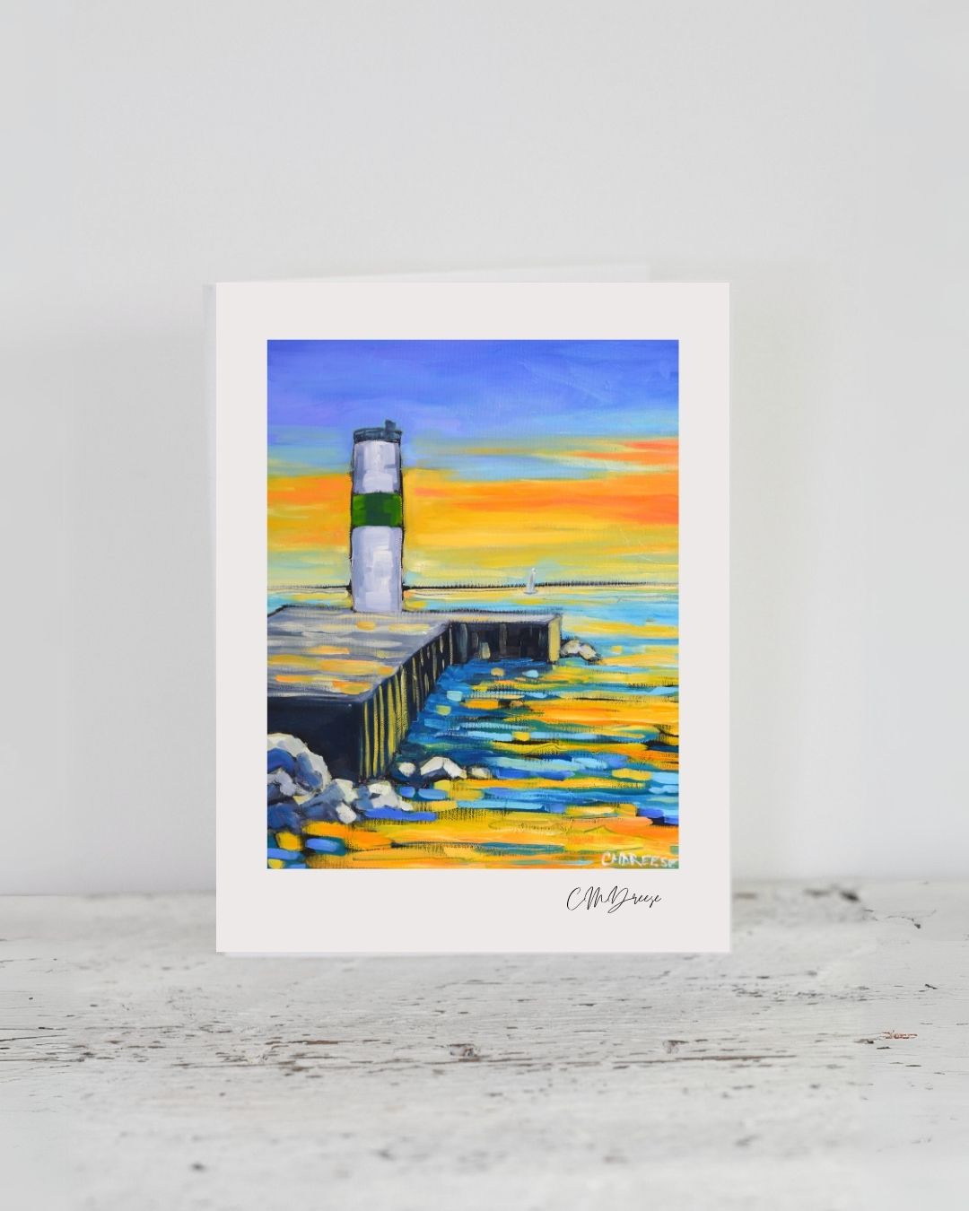 Notecard featuring original artwork of Pentwater Lighthouse by Christi Dreese on linen-textured paper