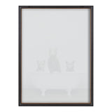 Framed glass print showing three light-colored bears sitting inside a white vintage clawfoot bathtub against a plain light background.