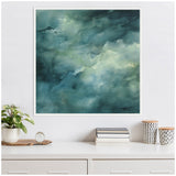 Abstract canvas artwork with rich green and teal watery patterns, framed and displayed on a white wall above a white cabinet with decorative items.