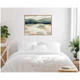 Abstract landscape wall art featuring soft green, beige, and blue brushstrokes above a neatly made white bed in a minimalist bedroom setting.