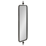 Tall, narrow rectangular mirror with rounded corners, framed in black metal, featuring decorative black finials at top and bottom ends, shown from an angled front view.