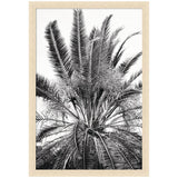 No 15 by Alicia Bock Framed Wall Art Print showing a person sitting near a window with plants and warm woodgrain stripe blonde frame