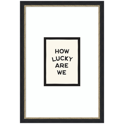 Framed 'How Lucky Are We' inspirational quote poster by Lucky Guava featuring black Belmont frame