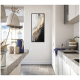Vertical abstract wall art with swirling white, black, and gold hues, displayed in a bright modern kitchen with light countertops and large window.