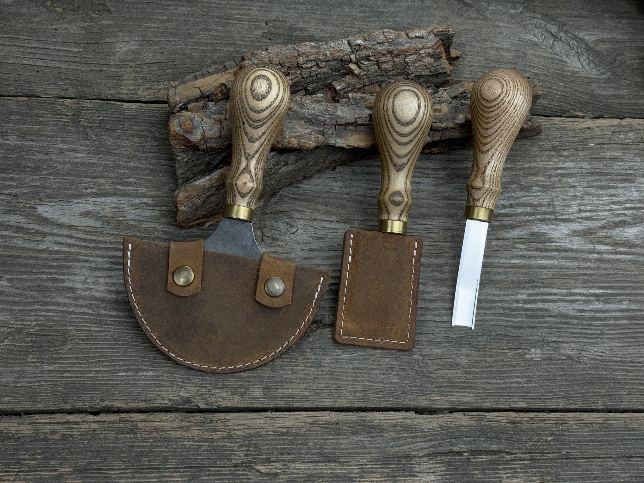 3-piece leather working kit with leather sheaths including half moon knife, flat skiving knife, and edge skiver