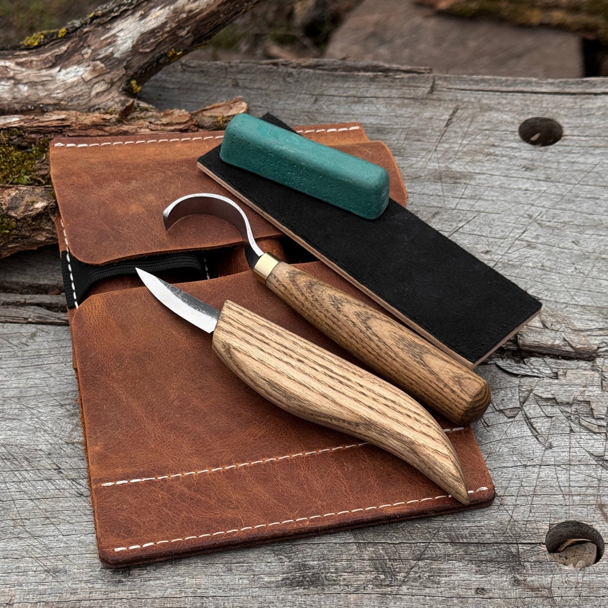 3-piece spoon carving set including whittling knife, hook knife, and leather sharpening strop with ash wood handles