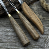 3-piece wood carving tool set with whittling knife, carving gouge, and V-parting chisel on a wooden surface