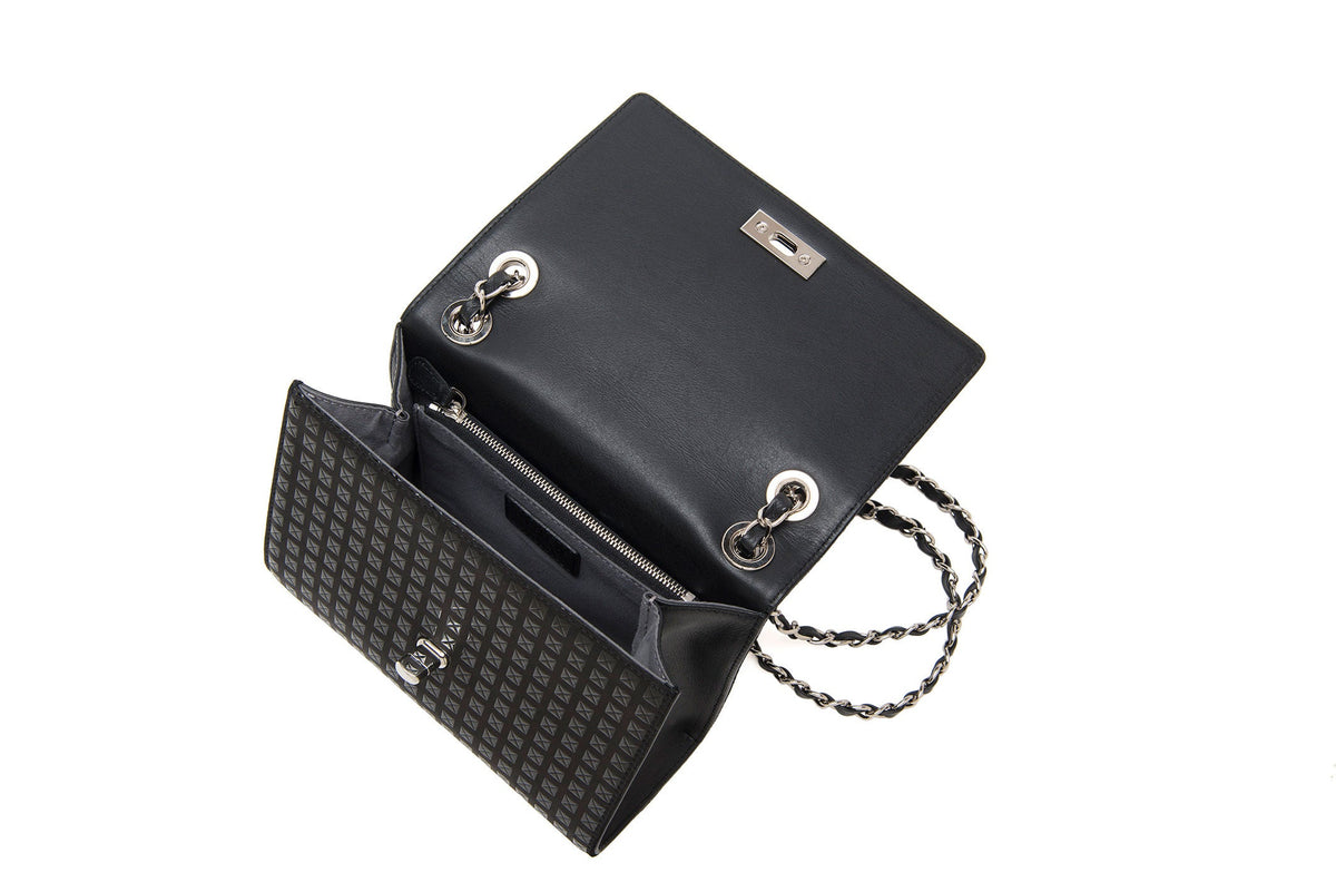 Black leather shoulder bag with silver chain strap and textured front flap, shown open revealing inner compartments and zip pocket.