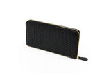 Black zipped long wallet with a repeating geometric pattern and gold-toned zipper hardware, shown at a slight angled side view on a white background.