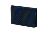 Dark blue rectangular business card case with a geometric circular pattern embossed over its surface, shown standing upright against a white background.