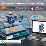 Blue and silver desktop CNC router with acrylic safety guard carving wood, next to laptop showing 3D elephant model compatible with Fusion 360 and GRBL software logos above.