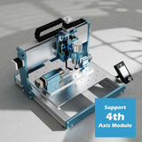 Compact desktop CNC router with blue aluminum frame, silver workbed, and attached digital control panel, shown from a high angle on a neutral surface.