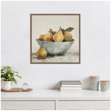 Framed vintage-style still life painting of pears and apples in a pale blue bowl with one pear outside, displayed above a white sideboard with a plant and books.