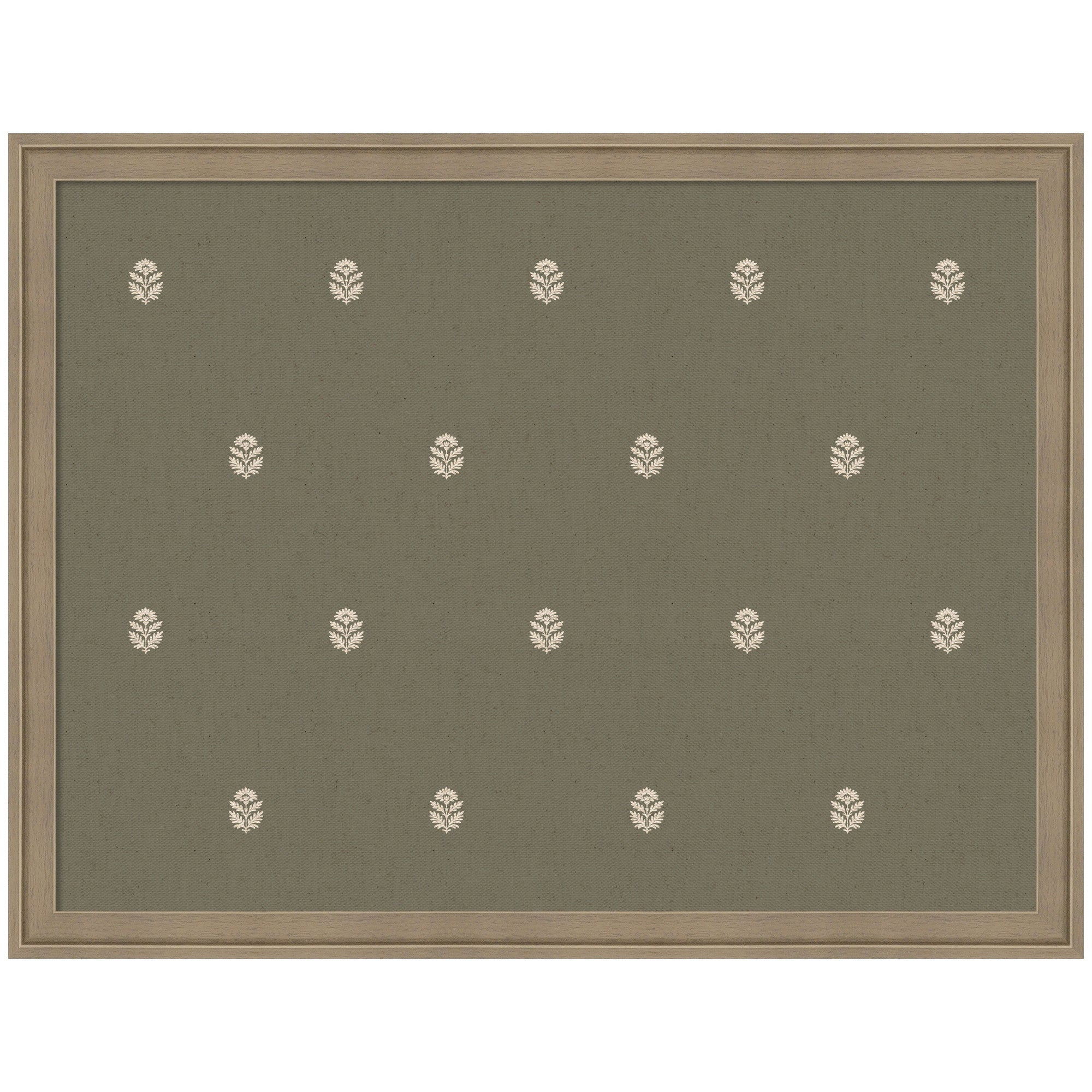 Fabric pinboard with green botanical block print framed in light brown wood, styled with photos and notes pinned