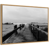 Black and white framed canvas print of coastal beach boardwalk by Patricia Hasz