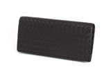 Rectangular dark brown long wallet with a textured diamond pattern covering its surface, shown resting on a white background.