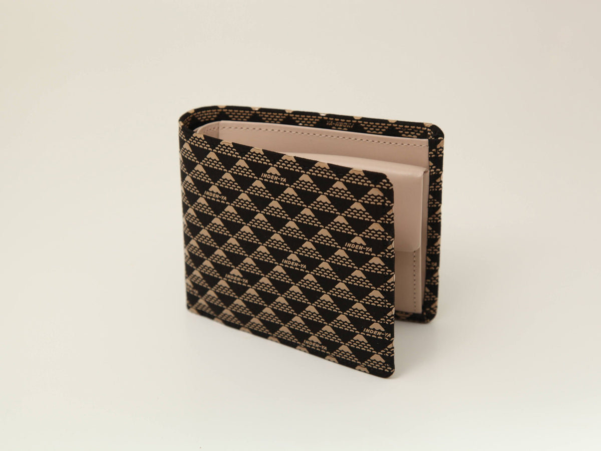Brown and black checkered pattern wallet partially open showing light beige interior with card slots, viewed at slight angle on plain off-white background.