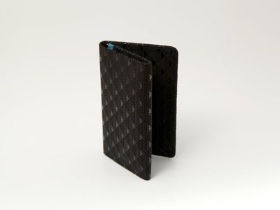 Takane Business Card Case in Black x Black color showing lacquered deer leather exterior and compact design