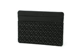 Black Inden card case with a geometric diamond pattern embossed on the lower half and smooth leather upper half embossed with 'INDEN' and 'JAPAN'