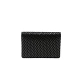 Black rectangular business card case with a textured chevron pattern creating a three-dimensional geometric effect on its surface.