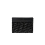 Black card case with a textured chevron geometric pattern on the lower portion and smooth upper section with embossed text, front view on white background.