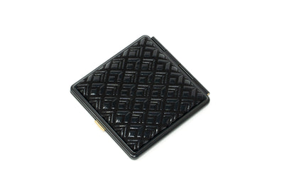 Inden Mirror - Diamond Frame showing exterior diamond pattern of deer skin with natural lacquer finish