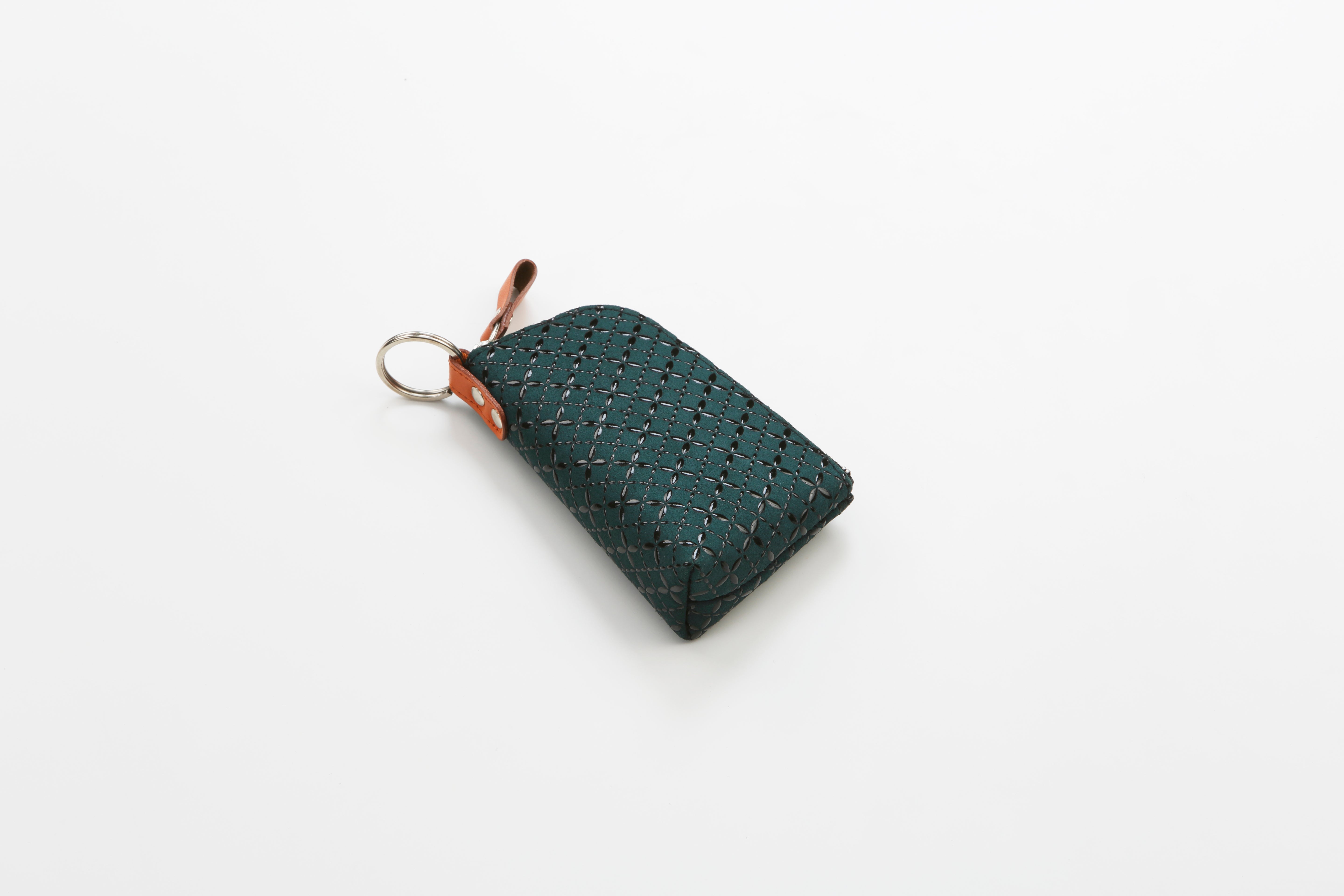 HISOKA Key Case in Black x Black and Green x Green colors, showing zipped leather cases with key rings