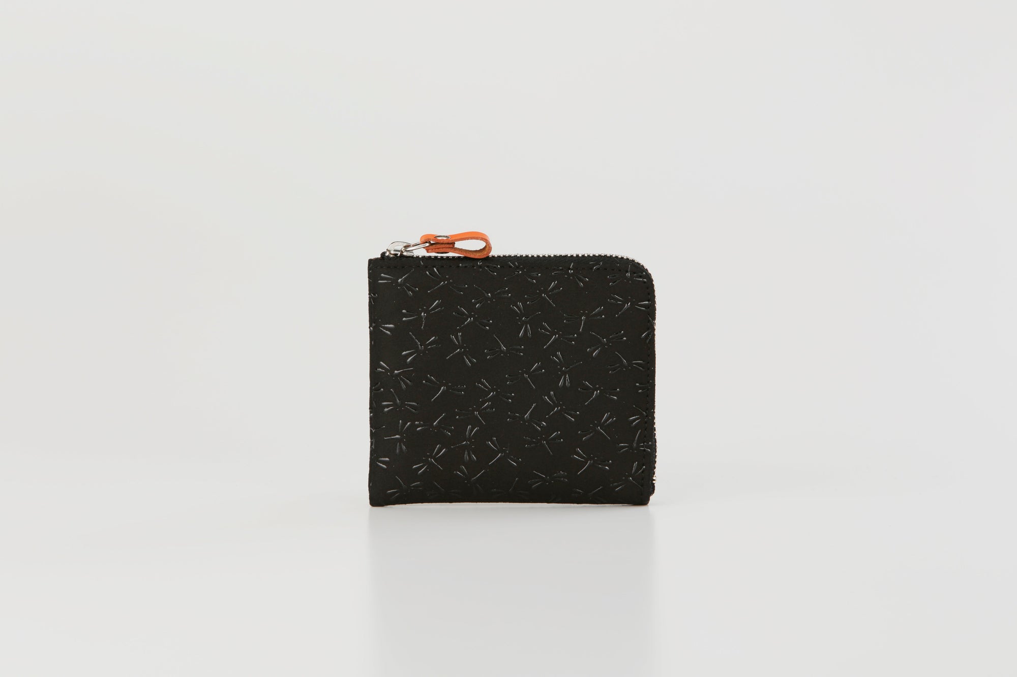 HISOKA Dragonfly coin purse in black lacquered deer leather with zipper, displayed on neutral background