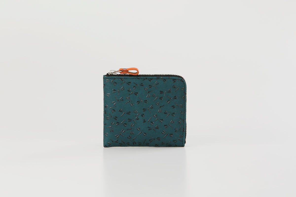 Square teal coin purse with a subtle dragonfly pattern and contrasting orange zipper tab, shown upright on a plain white background.