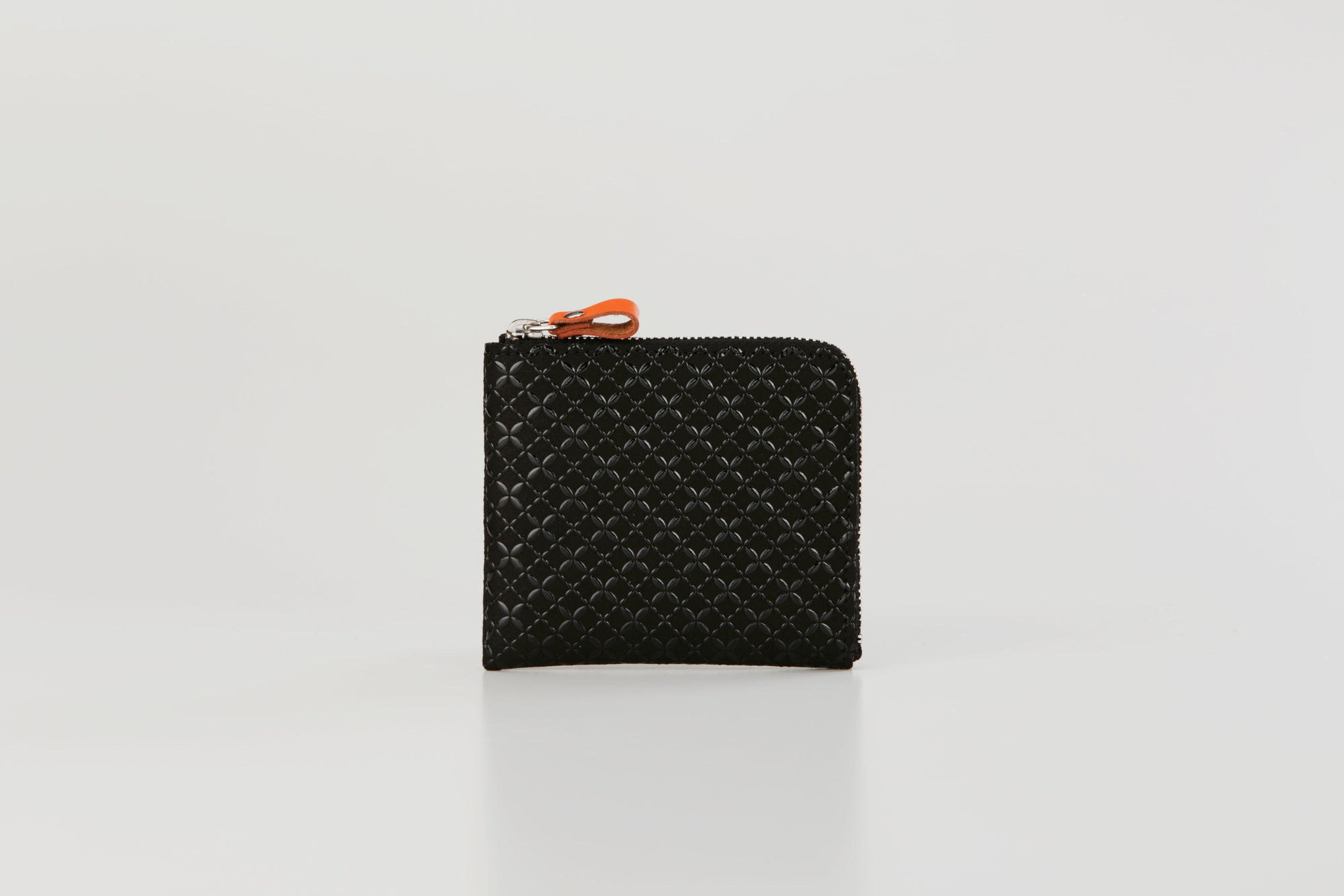 HISOKA New Seven Treasures coin purse in black leather with zipper closure and patterned exterior